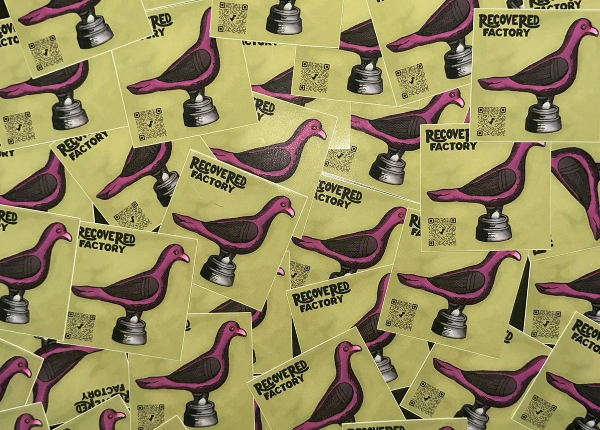 Recovered Factory 'Pink Pigeon' stickers at NICAR 2026